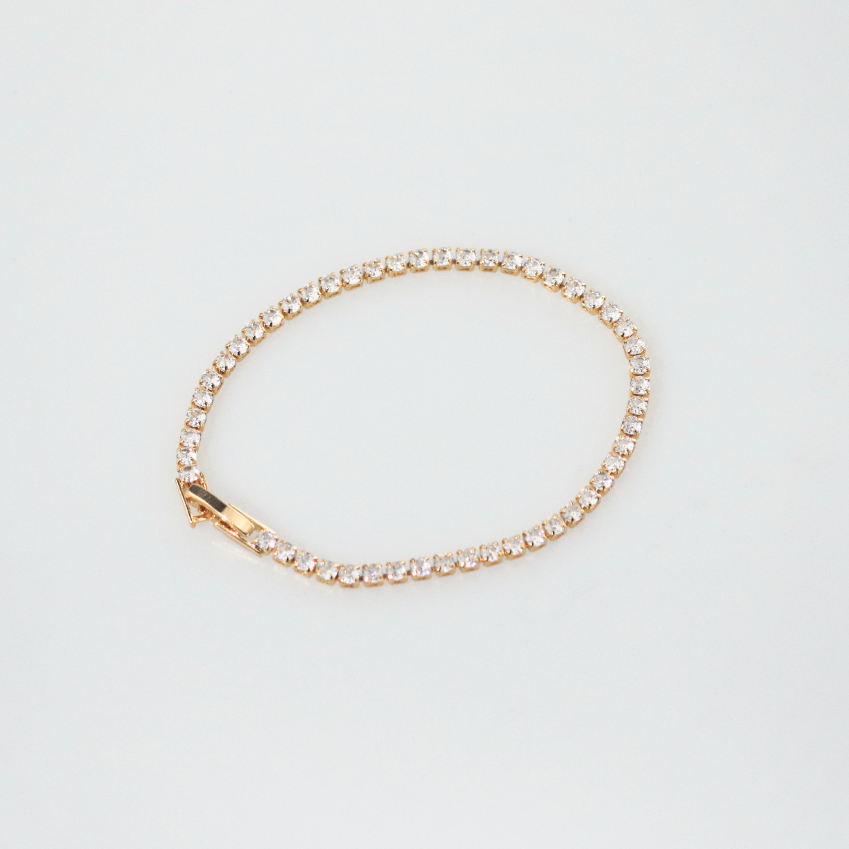 Gold tennis bracelet