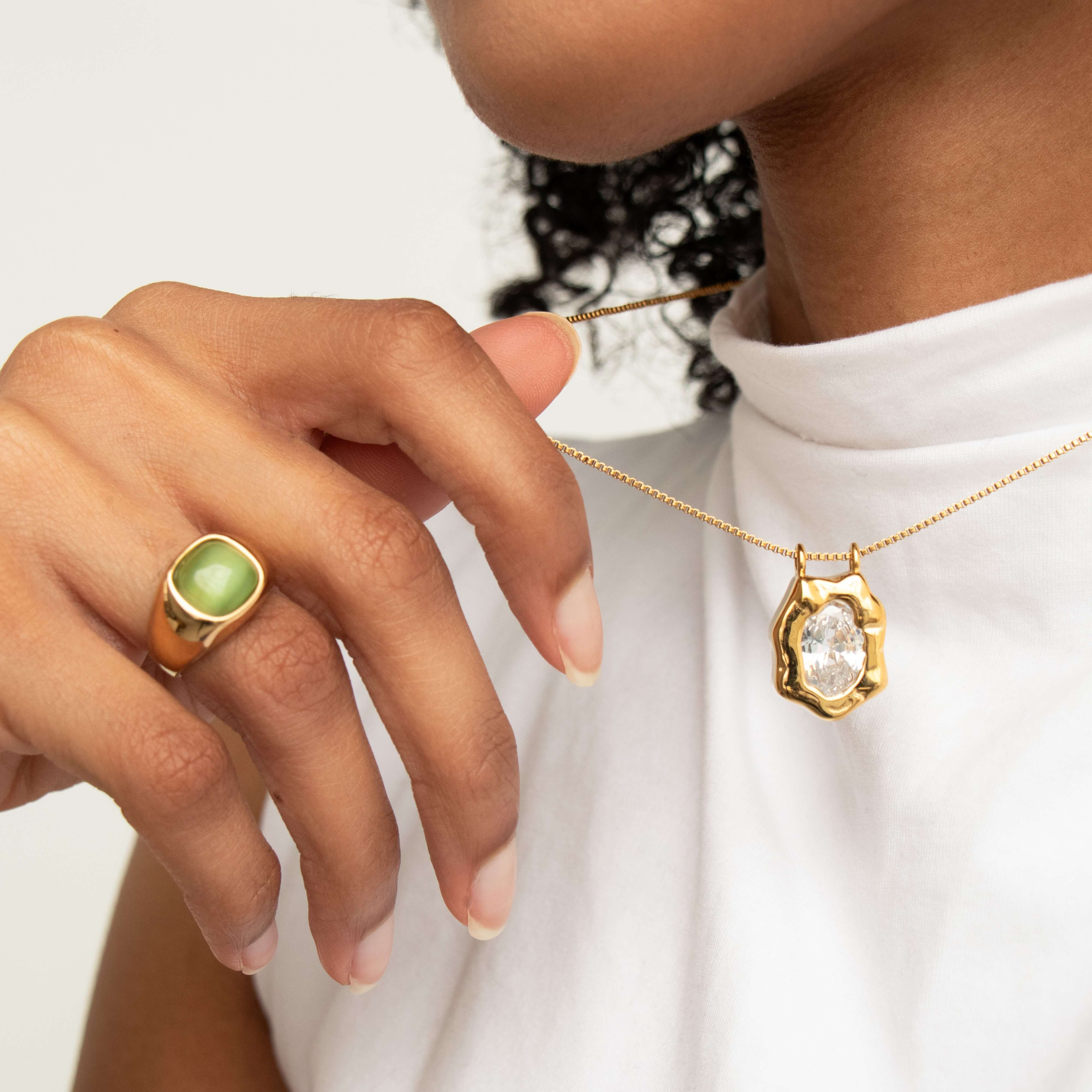 green cats eye signet ring