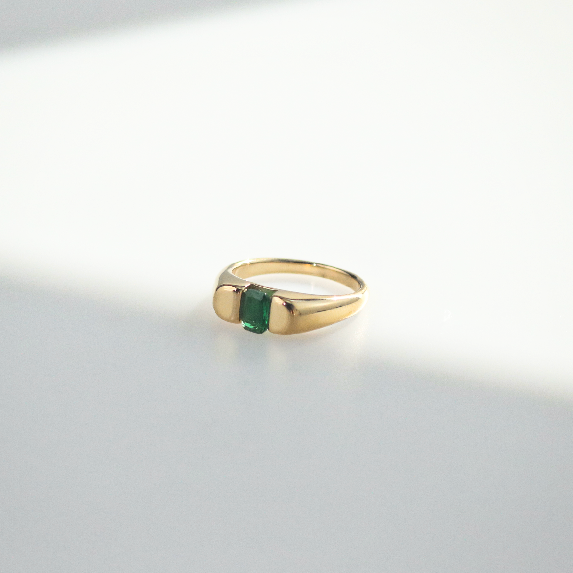 green signet ring