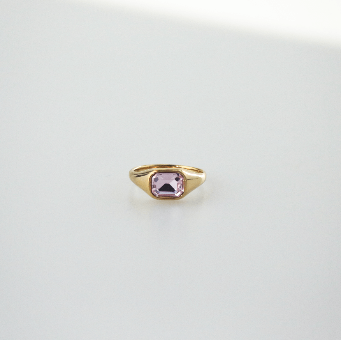 pink stone emerald cut ring