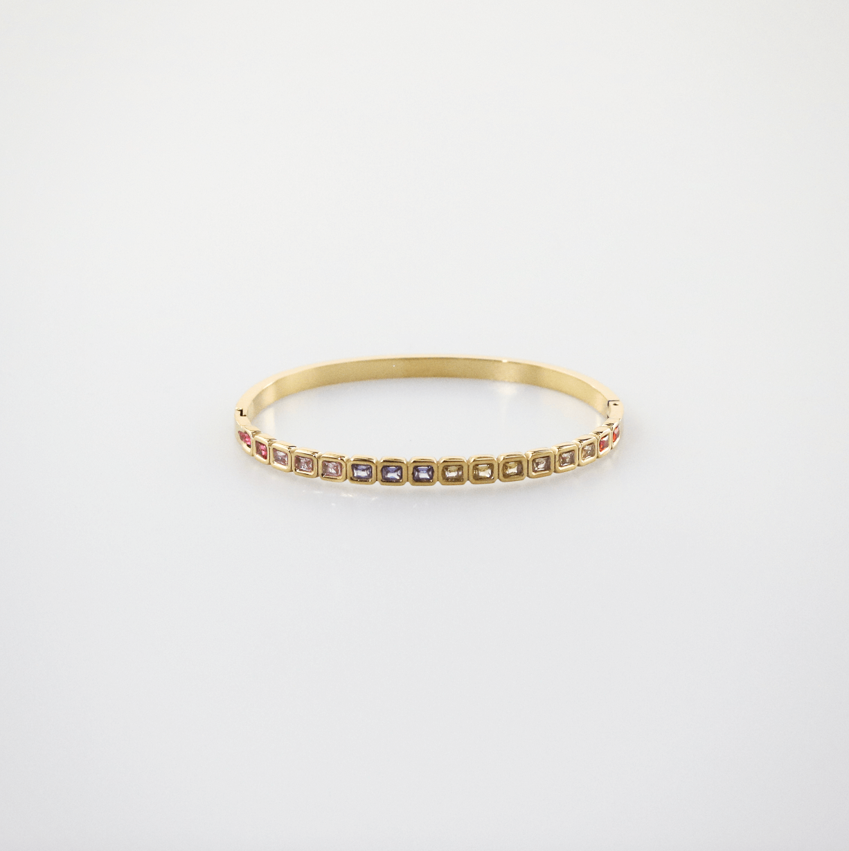 gold bangle bracelet with colored stones