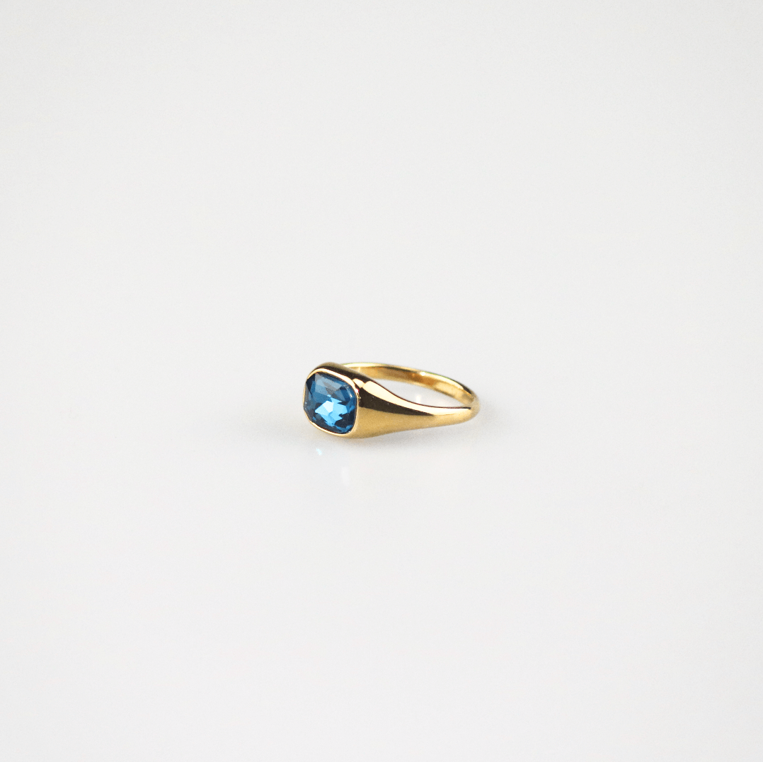 blue emerald cut ring
