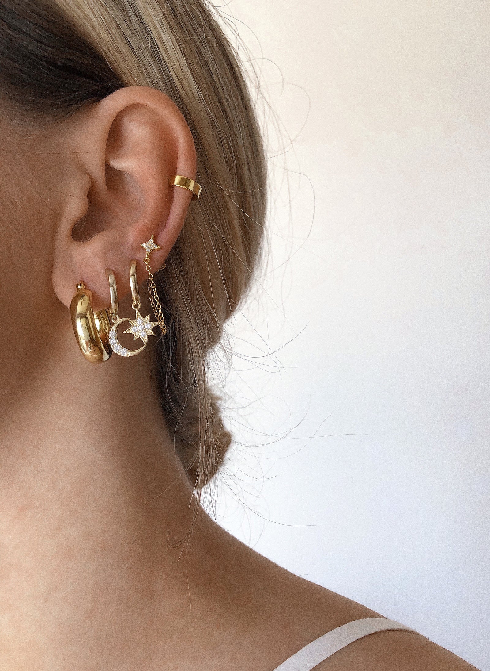 ear stack with star and moon hoop earrings