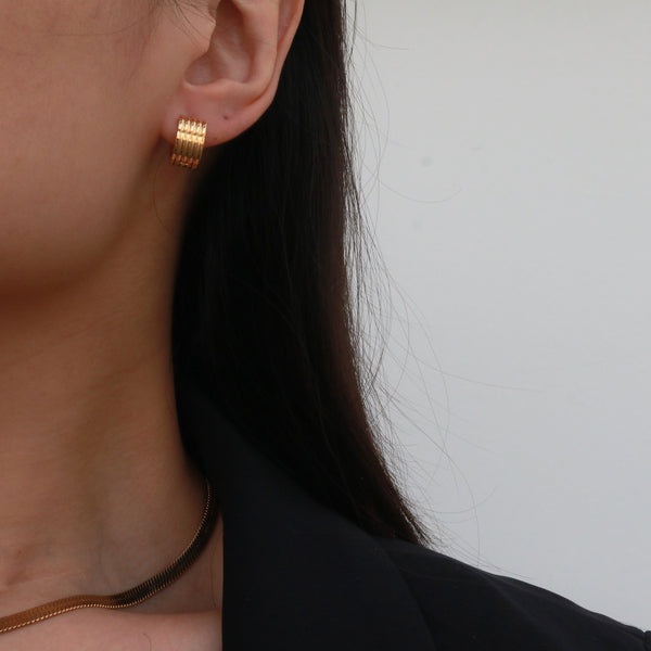 Gold chunky huggie earrings