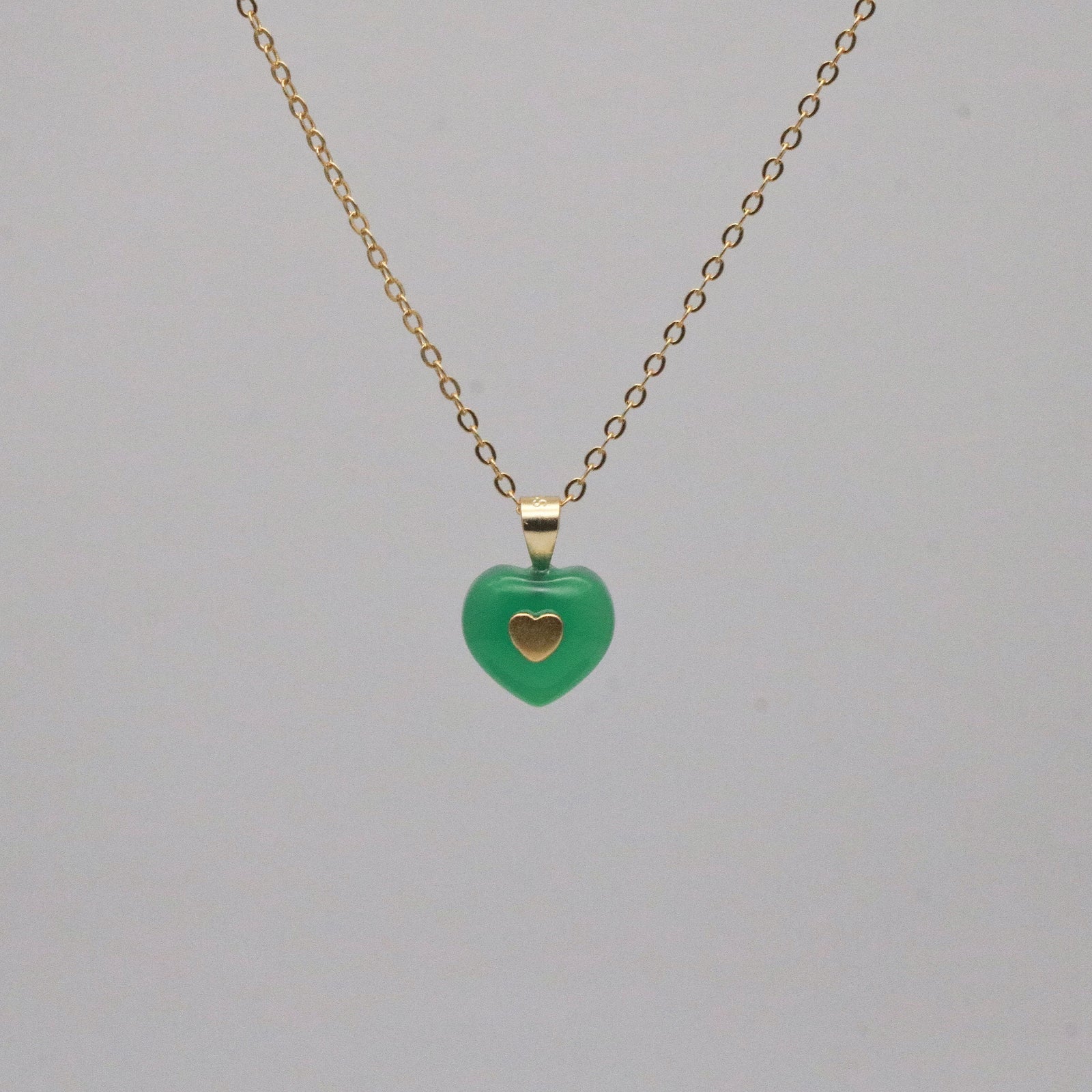 Green heart pendant necklace