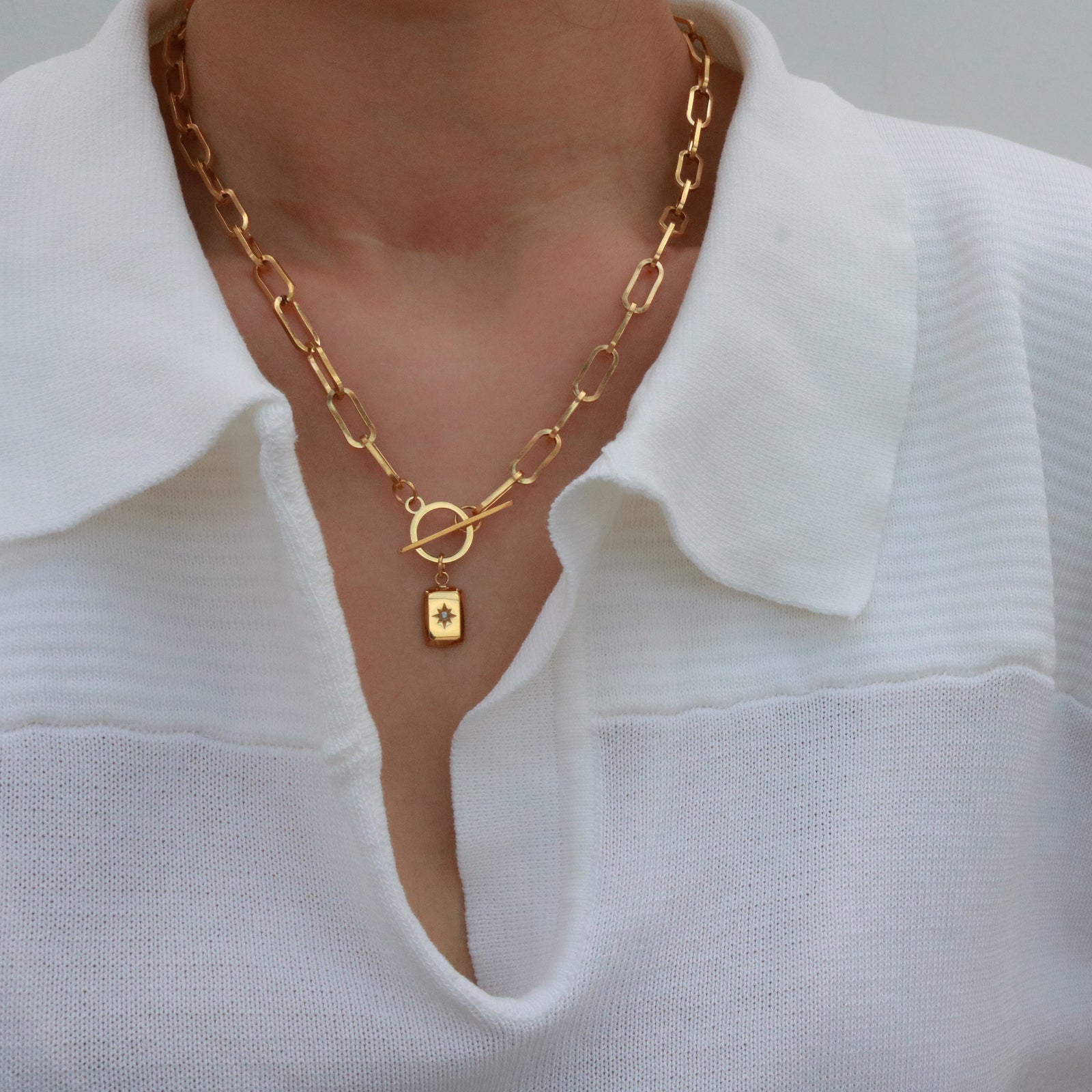 gold starburst toggle necklace