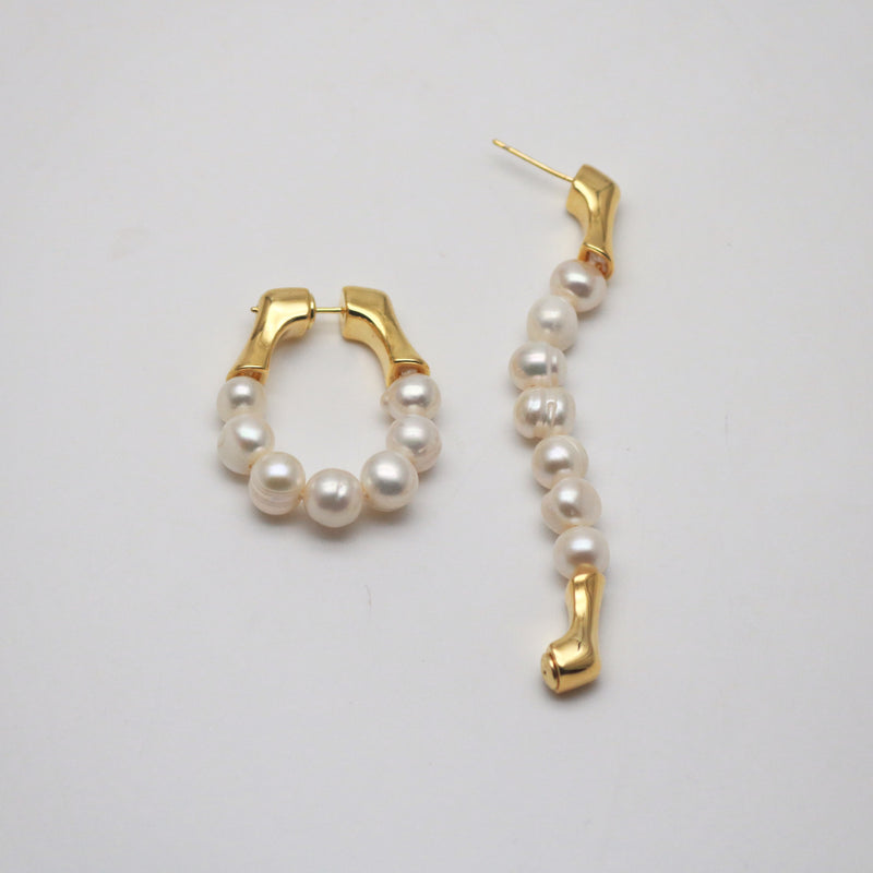freshwater pearl strand earrings, one is in a loop, the other one is open
