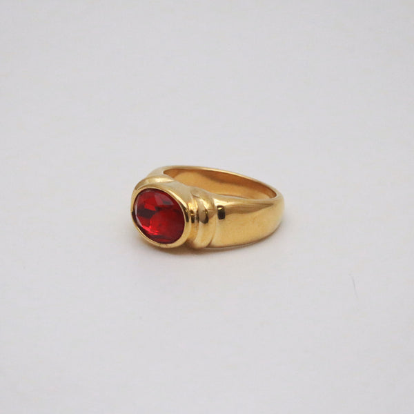 gold ring with ruby gemstone