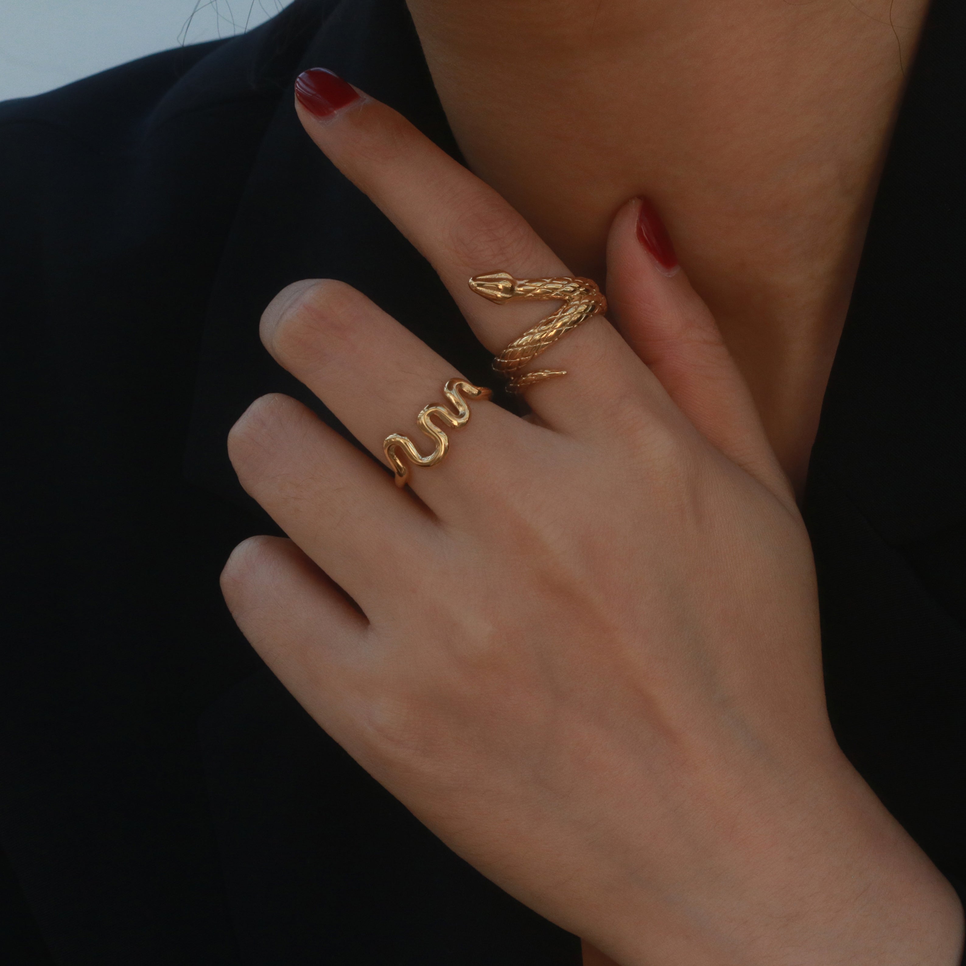 gold squiggle wave ring and gold snake ring