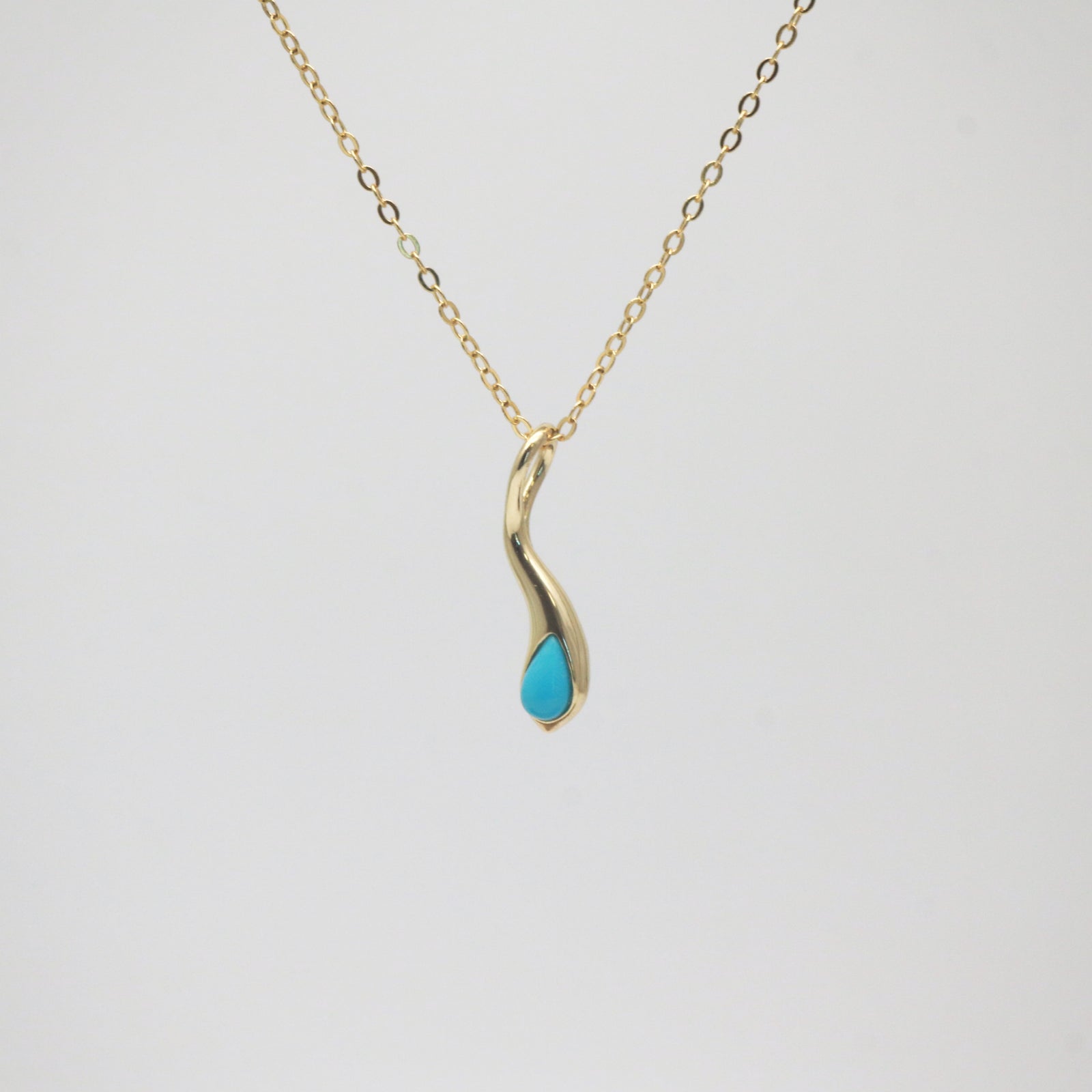 turquoise teardrop pendant necklace in yellow gold